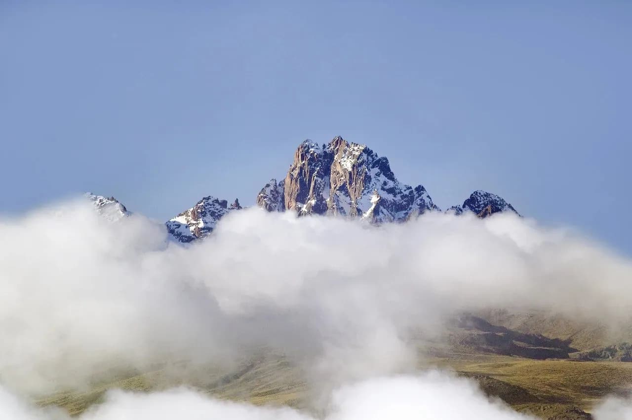 Mount Kenya's summit rising above a sea of cloud